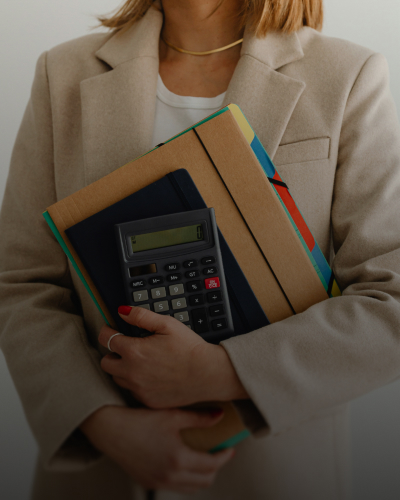 Person managing assets on laptop